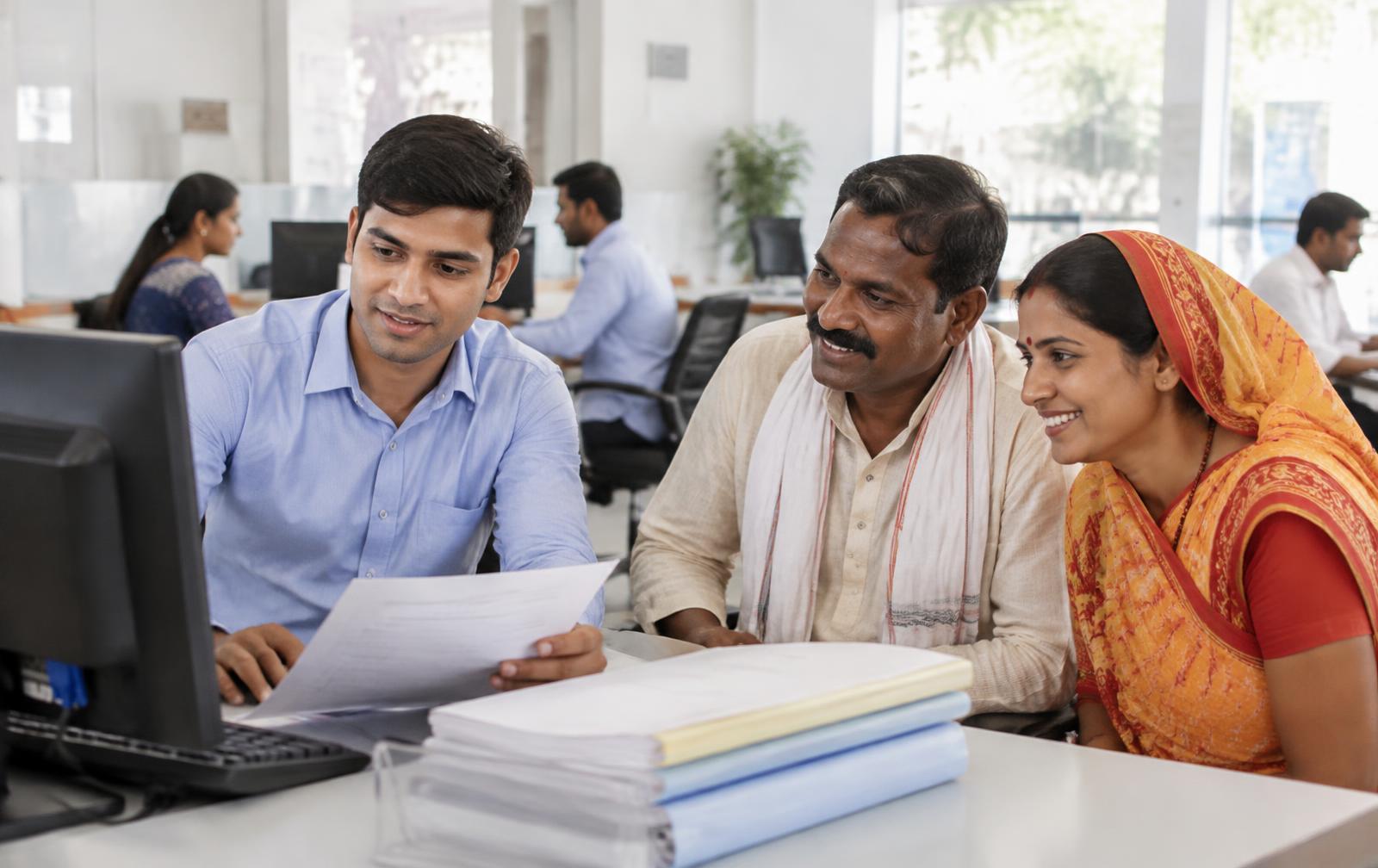 Digital service operator helping a family with online documents